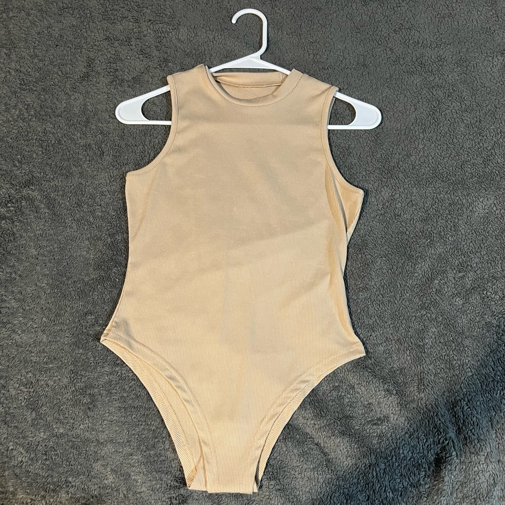 High neck, sleeveless bodysuit